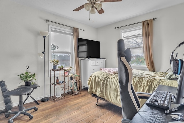2004 N Monticello St, Big Spring, TX 79720 - bedroom featuring wood finished floors and a ceiling fan