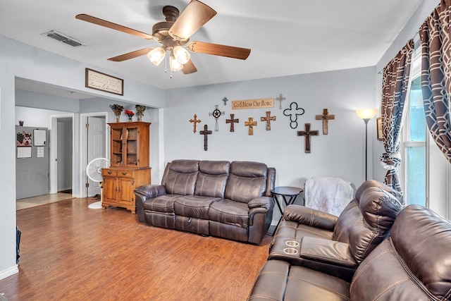 2004 N Monticello St, Big Spring, TX 79720 - living room featuring ceiling fan and wood finished floors