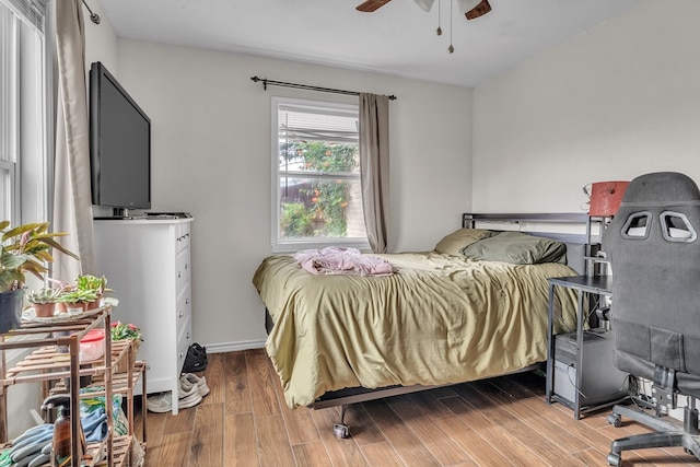 2004 N Monticello St, Big Spring, TX 79720 - bedroom with light wood finished floors and ceiling fan