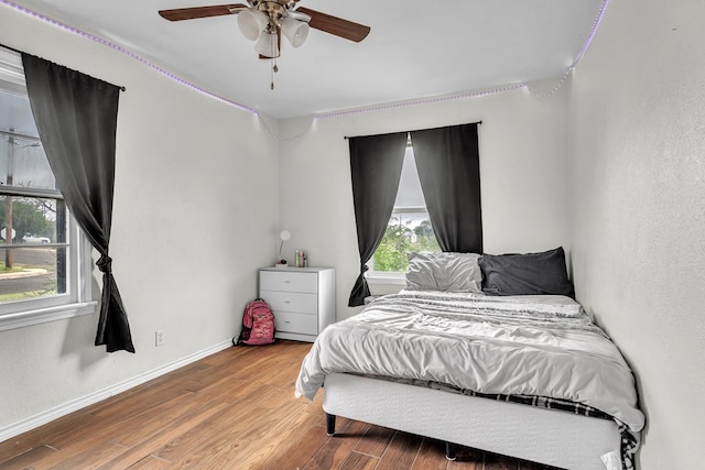 2004 N Monticello St, Big Spring, TX 79720 - bedroom featuring wood finished floors and ceiling fan