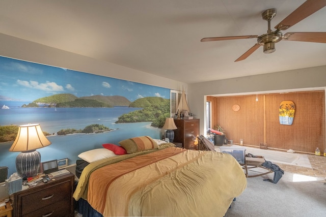 bedroom with a ceiling fan and carpet flooring