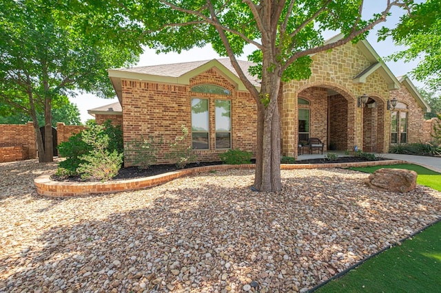 801 Keystone Ct, Midland, TX 79705 - view of front of home with brick siding and roof with shingles