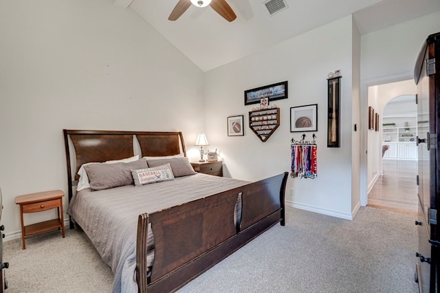 801 Keystone Ct, Midland, TX 79705 - bedroom featuring light carpet, vaulted ceiling, baseboards, and ceiling fan
