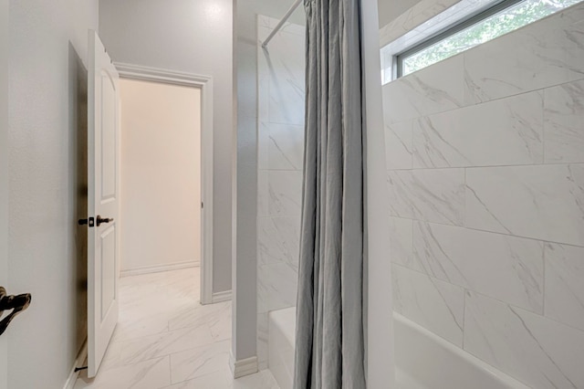 801 Keystone Ct, Midland, TX 79705 - bathroom with marble finish flooring and shower / bathtub combination with curtain