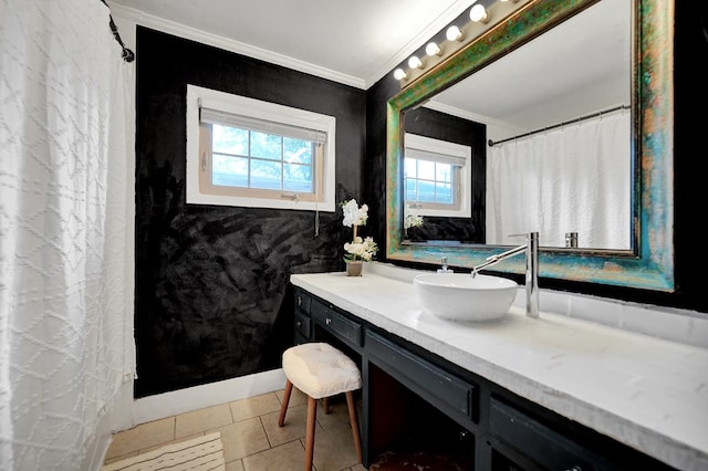 2202 Princeton Ave, Midland, TX 79701 - bathroom featuring crown molding, vanity, tile patterned flooring, baseboards, and curtained shower