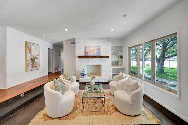2202 Princeton Ave, Midland, TX 79701 - living area featuring hardwood / wood-style flooring, baseboards, built in features, and recessed lighting