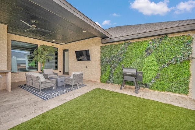 view of patio featuring an outdoor hangout area and a ceiling fan