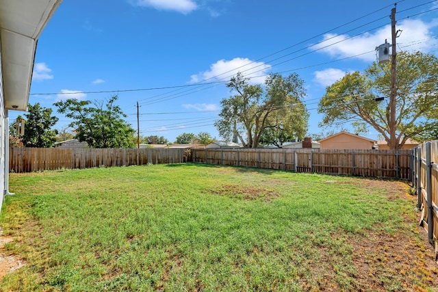 view of yard featuring a fenced backyard