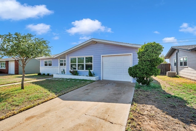 ranch-style house featuring driveway, central AC, fence, a front lawn, and an attached garage