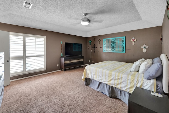 4107 Crestgate Ave, Midland, TX 79707 - bedroom with carpet floors, a textured ceiling, ceiling fan, and baseboards
