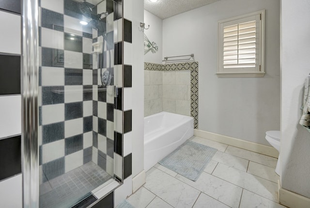 4107 Crestgate Ave, Midland, TX 79707 - full bath with a shower stall, a textured ceiling, toilet, a tub to relax in, and baseboards