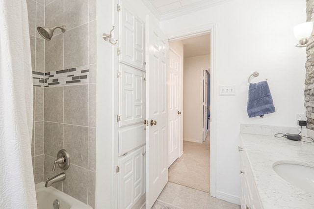 full bathroom featuring ornamental molding, tile patterned flooring, shower / bath combination with curtain, and vanity