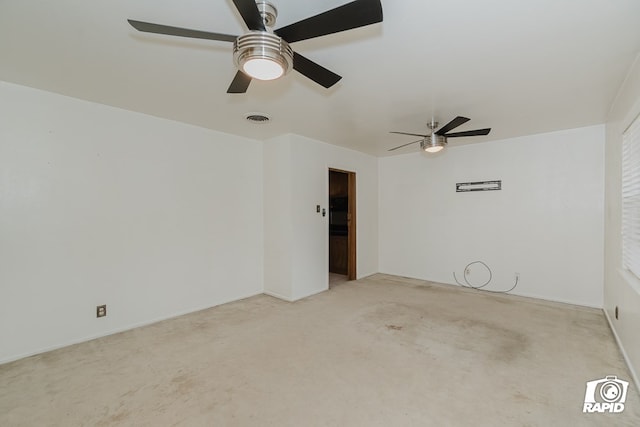 empty room featuring ceiling fan and light colored carpet