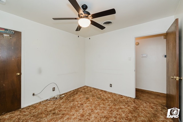 unfurnished room featuring carpet flooring and ceiling fan