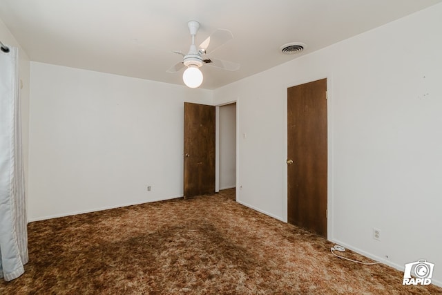 unfurnished room featuring carpet flooring and ceiling fan