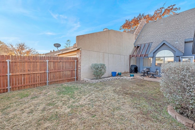 view of yard with a patio area