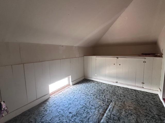 2311 30th St, Snyder, TX 79549 - additional living space with vaulted ceiling and carpet floors