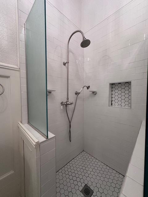2311 30th St, Snyder, TX 79549 - bathroom featuring tiled shower
