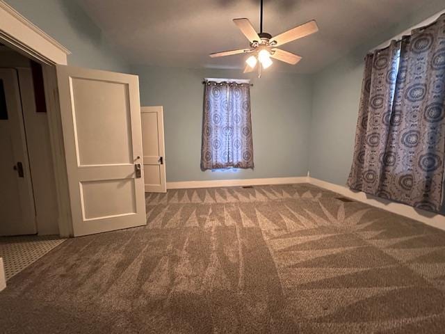 2311 30th St, Snyder, TX 79549 - unfurnished bedroom featuring carpet and ceiling fan