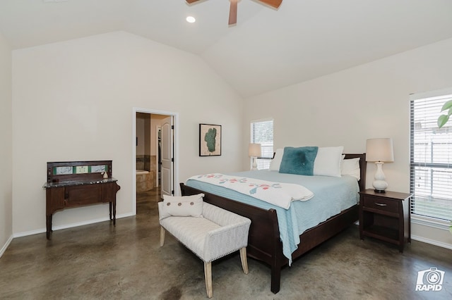 bedroom with baseboards, concrete flooring, vaulted ceiling, ceiling fan, and ensuite bath