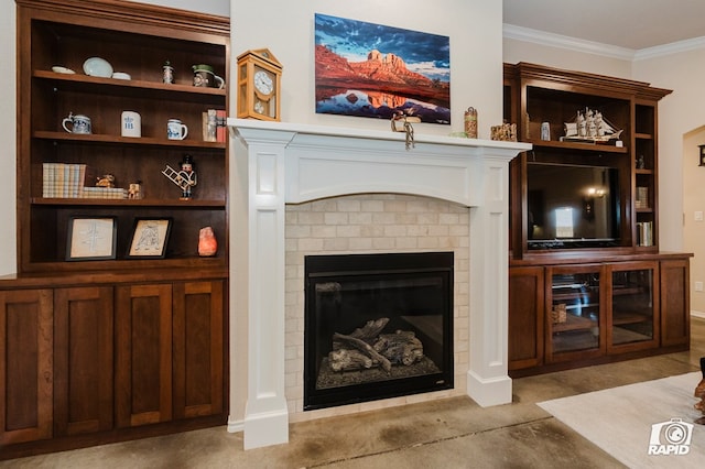 unfurnished living room featuring concrete flooring, a brick fireplace, ornamental molding, and baseboards