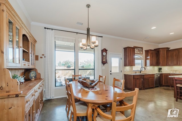 dining space with a chandelier, concrete flooring, ornamental molding, and recessed lighting