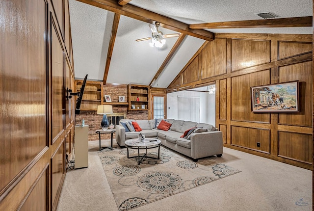 living room featuring light carpet, visible vents, beamed ceiling, a textured ceiling, and wood walls