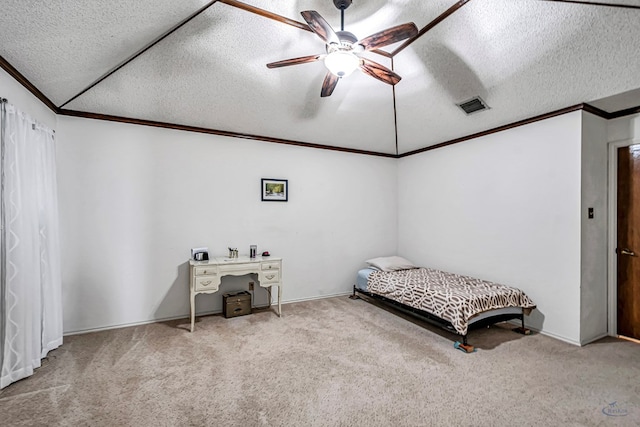 bedroom featuring visible vents, crown molding, light carpet, and a textured ceiling