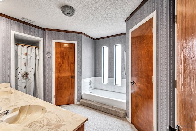 full bath with crown molding, a textured ceiling, a bath, and wallpapered walls