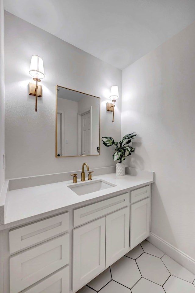 bathroom featuring tile patterned floors and vanity