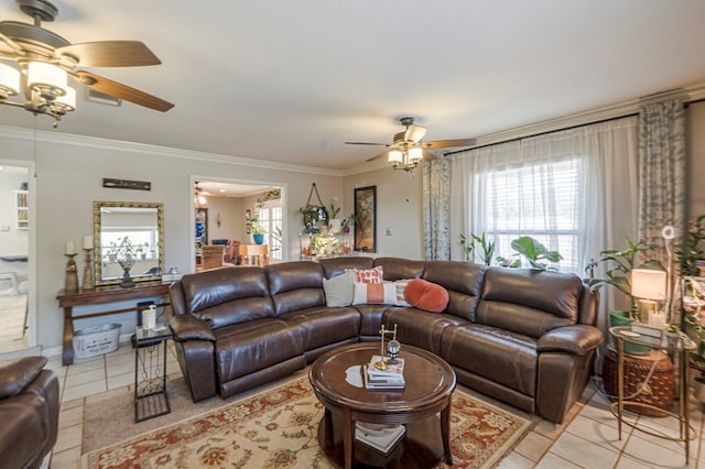 tiled living room featuring ceiling fan and crown molding