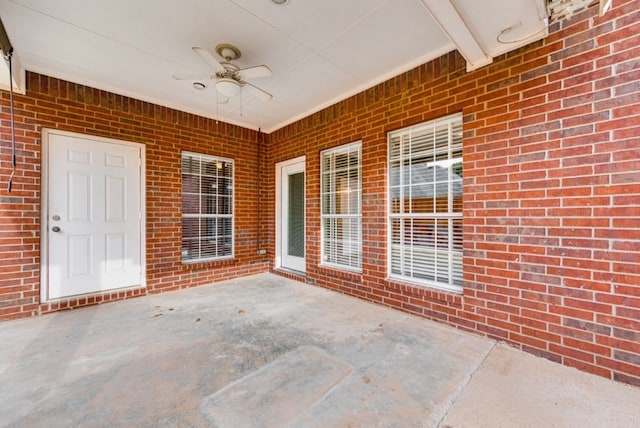 view of patio featuring ceiling fan