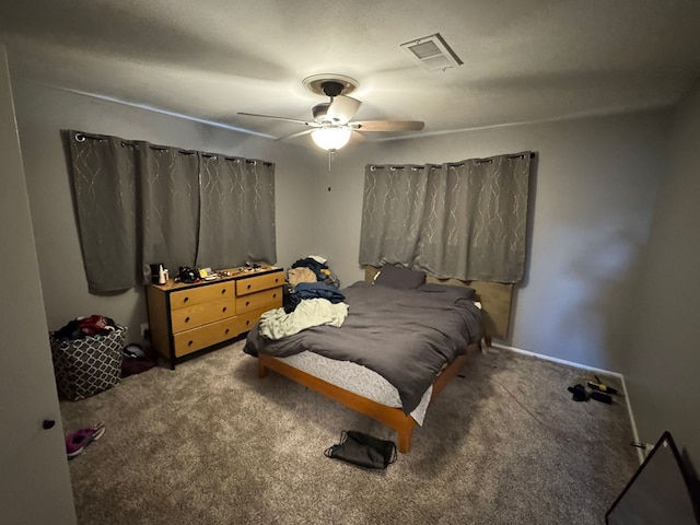 2408 Camarie Ave, Midland, TX 79705 - carpeted bedroom featuring ceiling fan