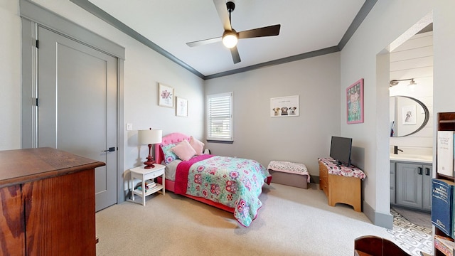 bedroom with crown molding, light colored carpet, and ceiling fan