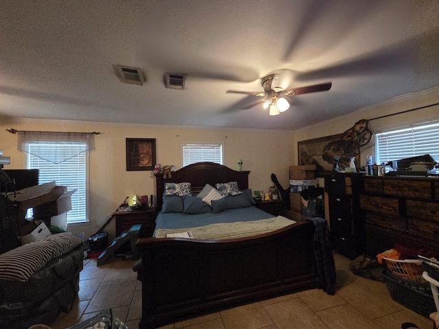 6208 E County Rd 84, Midland, TX 79706 - bedroom featuring crown molding, light tile patterned floors, and ceiling fan