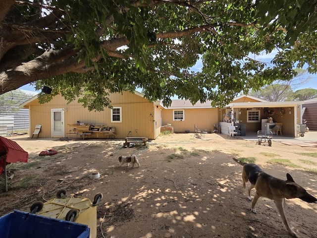 6208 E County Rd 84, Midland, TX 79706 - rear view of house featuring a patio