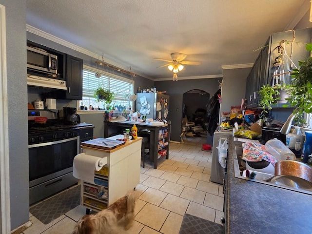 6208 E County Rd 84, Midland, TX 79706 - kitchen featuring stainless steel appliances, a ceiling fan, ornamental molding, light tile patterned flooring, and extractor fan