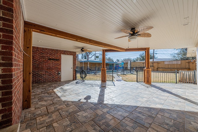 view of patio featuring a fenced backyard and a ceiling fan