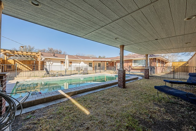 view of swimming pool with a fenced in pool, fence, and a patio