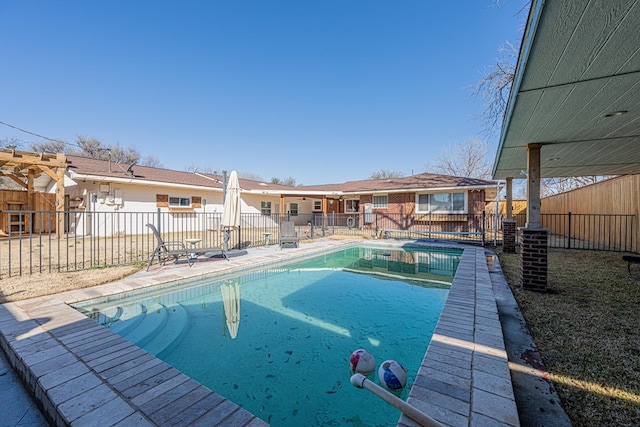 view of swimming pool with a fenced in pool, a residential view, a fenced backyard, and a patio