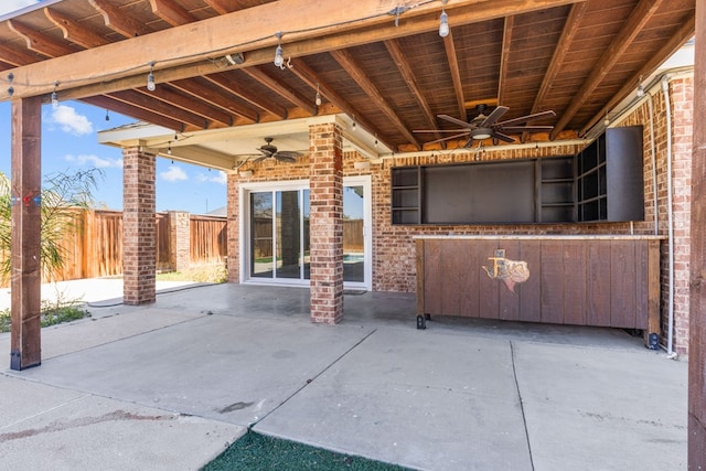 view of patio with ceiling fan