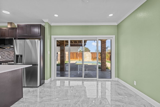 kitchen featuring stainless steel refrigerator with ice dispenser, decorative backsplash, crown molding, and dark brown cabinets