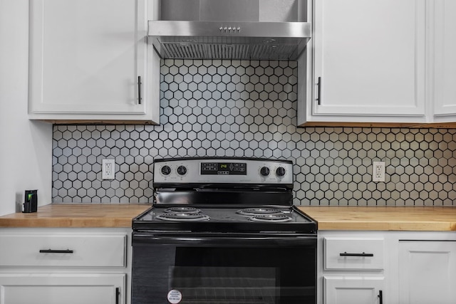 1344 E 5th St, Odessa, TX 79761 - kitchen featuring black range with electric stovetop, wood counters, under cabinet range hood, and backsplash