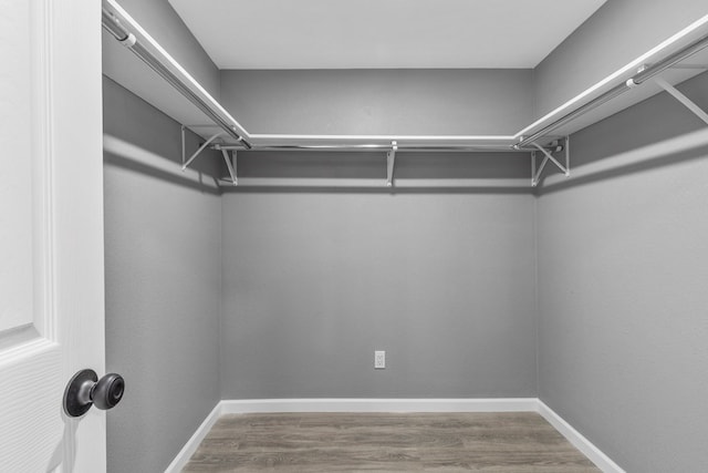 1344 E 5th St, Odessa, TX 79761 - spacious closet featuring wood finished floors