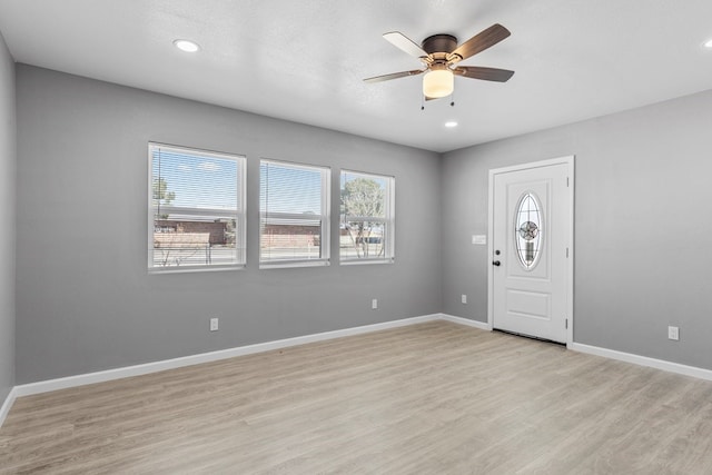 1344 E 5th St, Odessa, TX 79761 - entryway featuring light wood-style flooring, ceiling fan, baseboards, and recessed lighting