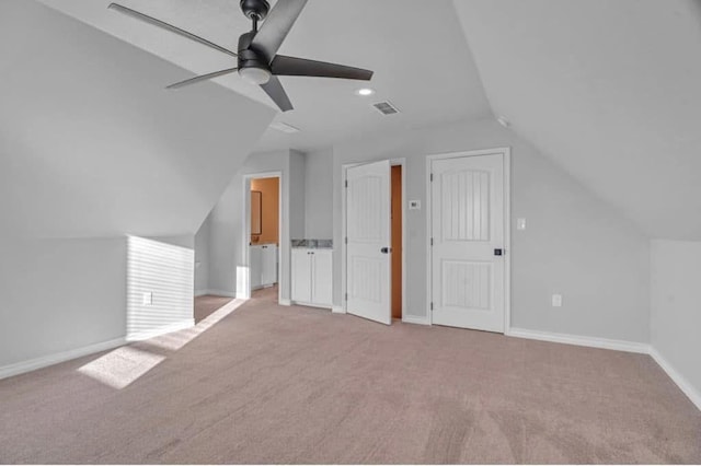 2212 S County Rd 1055, Midland, TX 79706 - additional living space featuring vaulted ceiling, light carpet, a ceiling fan, baseboards, and recessed lighting