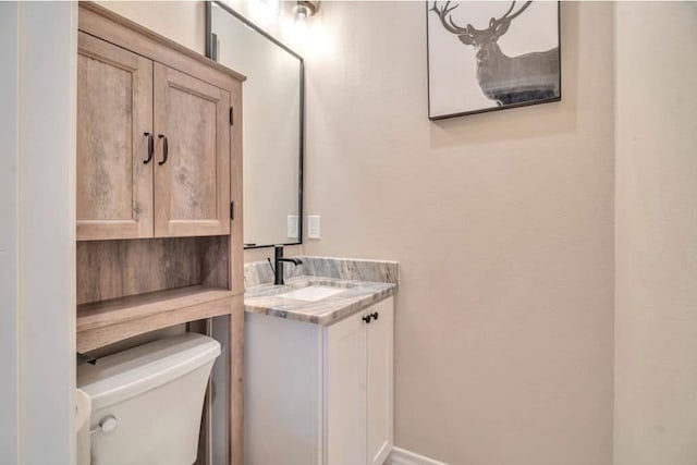 2212 S County Rd 1055, Midland, TX 79706 - bathroom with vanity and toilet