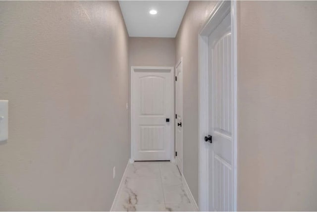 2212 S County Rd 1055, Midland, TX 79706 - corridor with light marble finish floors, baseboards, and recessed lighting