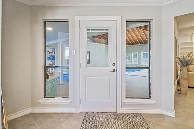 doorway with light tile patterned floors