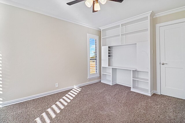 unfurnished bedroom with carpet floors, ceiling fan, and crown molding